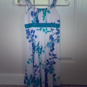 A blue, teal and white floral dress
